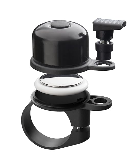 Sonnette de vélo AIRBELL montée sur un cintre, son logement de balise ouvert