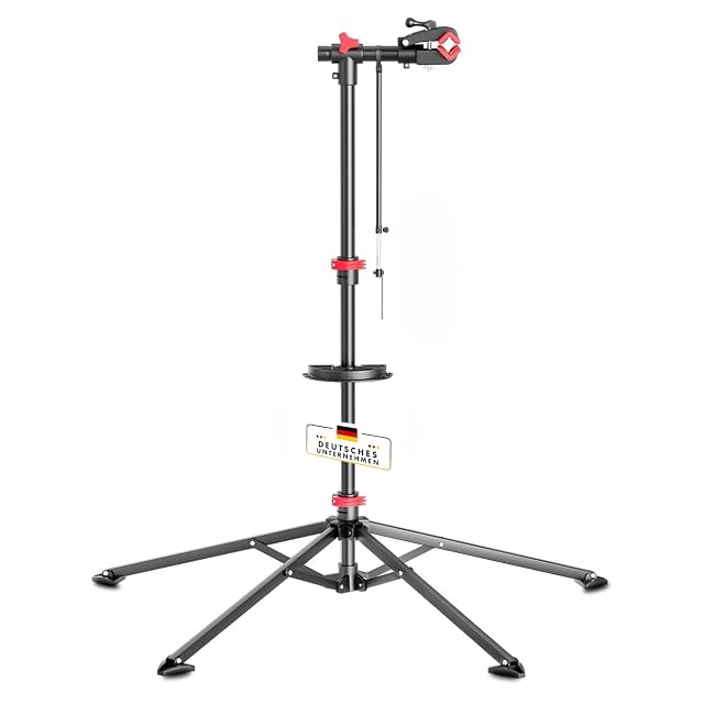 Pied d'atelier vélo Floordirekt Lois avec son plateau à outils et sa pince rotative
